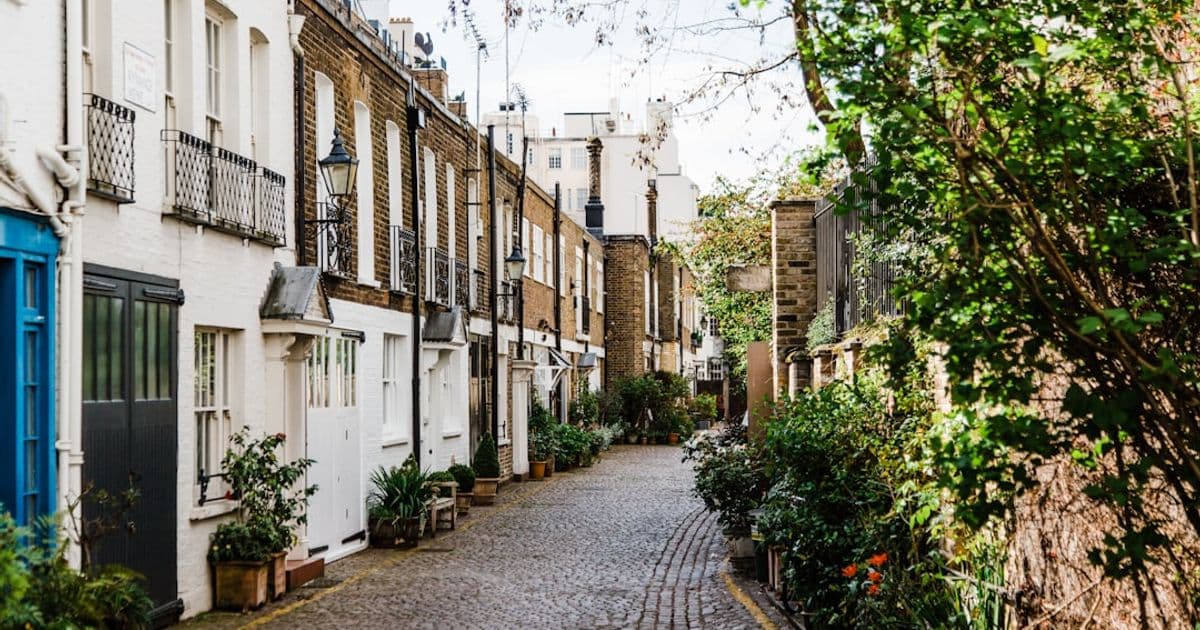 London prime residential townhouse facade on a quiet street, typical UK bridging loan security