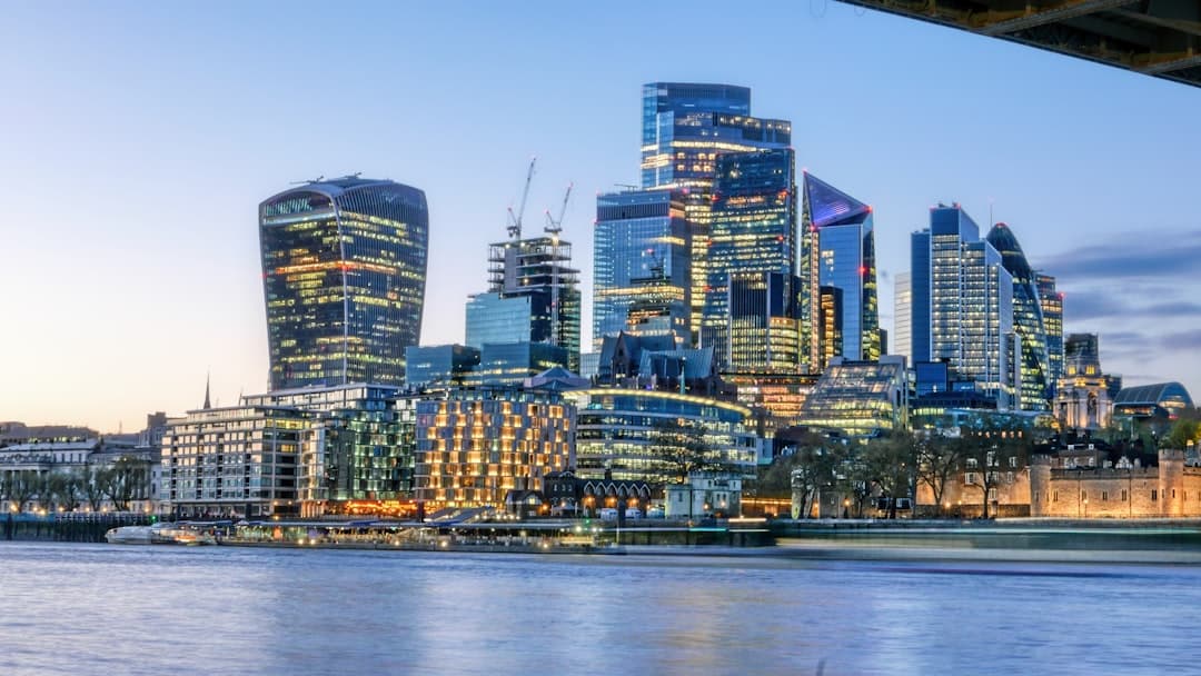City of London financial district skyline, home to law firms handling offshore UK security and Report on Title work