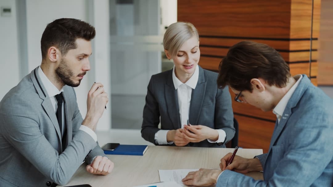 Solicitors in discussion at a London law firm office