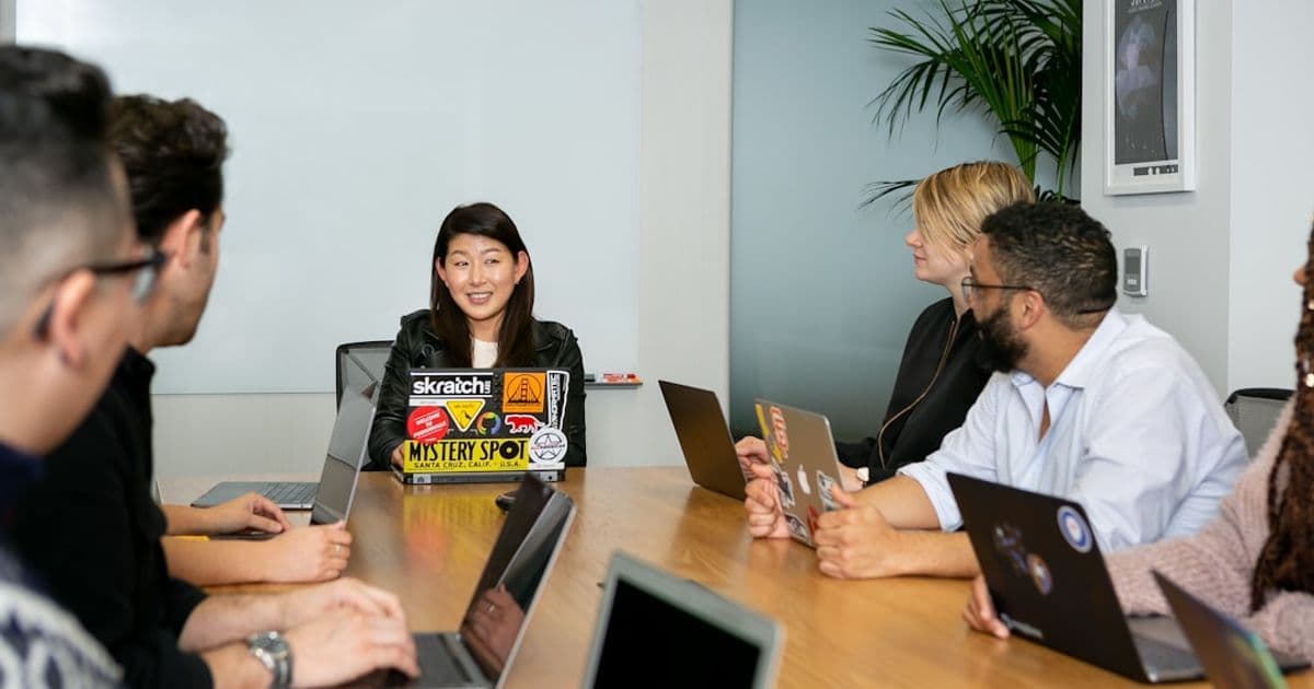 Private banker and client reviewing property documents in Singapore office